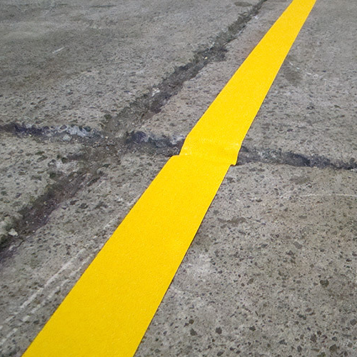 Žlutočerná Páska PERMASTRIPE RX - PVC extra odolný pás, 50 mm x 30 m